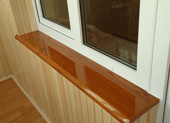 Обшивка задньої стінки балкона дерев'яною вагонкою