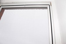 Как выглядит москитная сетка Анвис на пластиковом окне фото